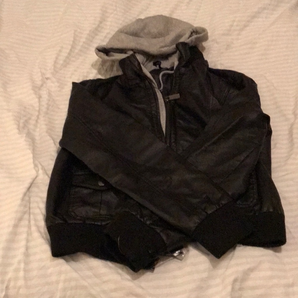 A faux leather black with grey fabric lining.